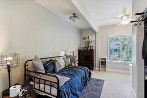 Bedroom with carpet and baseboards