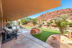 View of patio / terrace featuring a mountain view