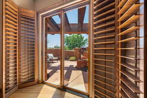 Doorway featuring light wood-style flooring