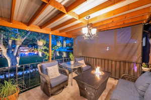 Patio / terrace with a fire pit
