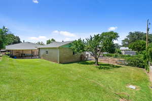 View of yard with a patio