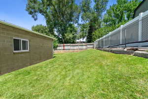 View of fenced backyard