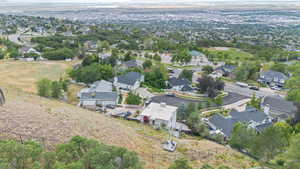 Aerial overview of property's location with nearby suburban area