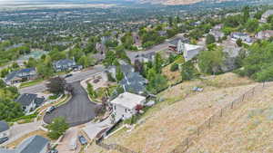 View of property location with nearby suburban area