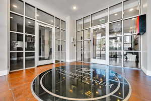 Interior space featuring french doors, recessed lighting, and floor to ceiling windows