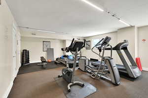 Gym featuring baseboards