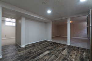 Basement dining area, and view of living room and second bedroom.
