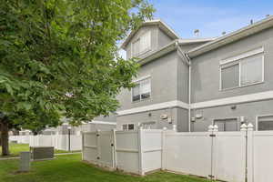 Back of house with stucco siding