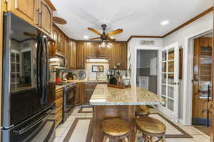 Updated Kitchen with granite counters and custom cabinets.