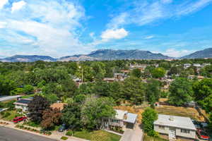 View of mountain background featuring nearby suburban area