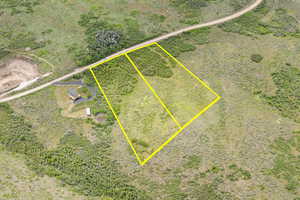 View of property location featuring property boundaries highlighted. Lot A with dirt road. Lot B below closest to neighboring home.