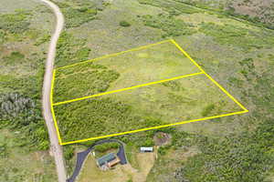 Aerial view of property and surrounding area with property parcel outlined. Lot A top lot.  lot B lower lot