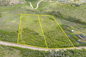Aerial view of property's location featuring property parcel outlined