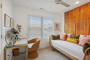 Carpeted bedroom with ceiling fan and recessed lighting