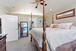 Bedroom featuring carpet flooring, vaulted ceiling, ceiling fan, and recessed lighting