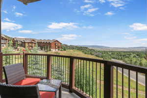 Balcony featuring a mountain view