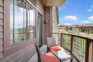 Balcony featuring a residential view