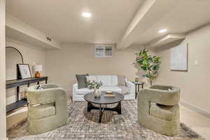 Living area featuring recessed lighting and carpet
