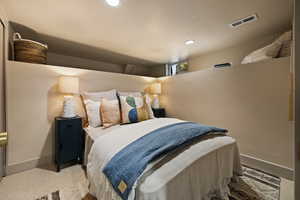 Bedroom featuring baseboards and recessed lighting