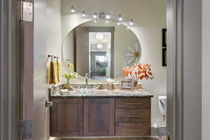 Bathroom with vanity and toilet