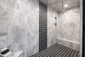 Full bath with tiled shower