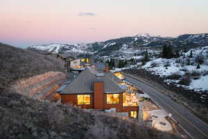 Snowy aerial view with a mountain view