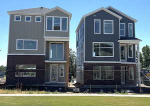 Home on the right side of photo is the property listed
