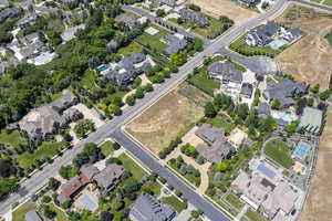 Aerial overview of property's location with nearby suburban area