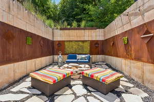 View of patio with an outdoor living space