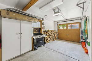 Garage featuring a garage door opener