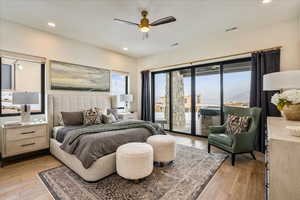 Bedroom with access to outside, light wood-style flooring, recessed lighting, and a ceiling fan