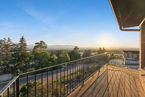 Balcony featuring a mountain view