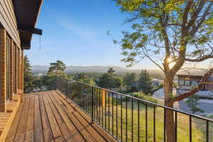 Deck featuring a mountain view