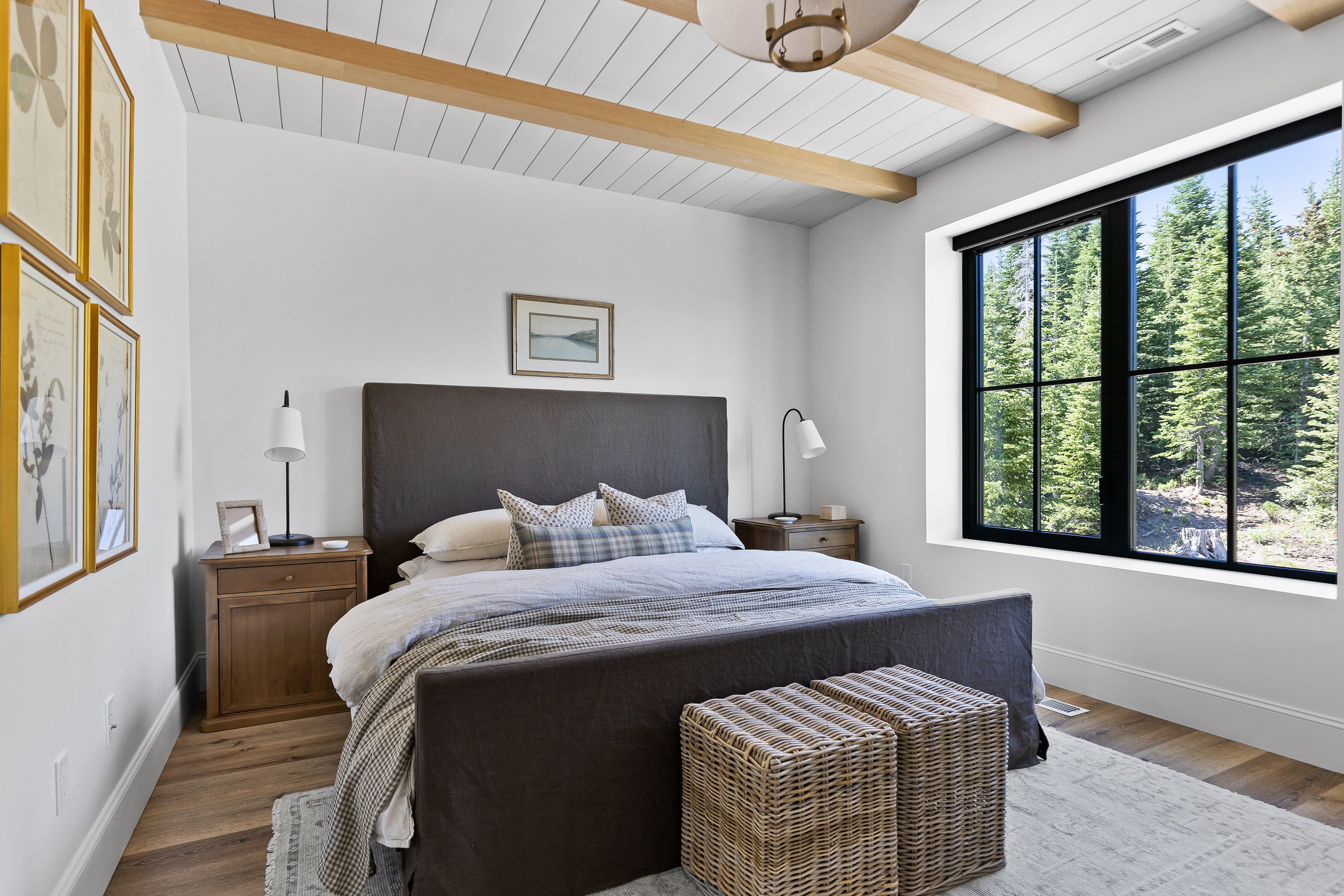 Bedroom featuring wood finished floors and a wood ceiling with exposed beams