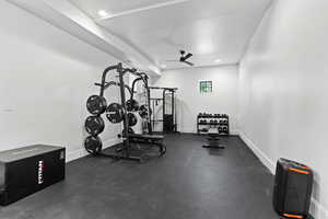 Workout room featuring recessed lighting and ceiling fan