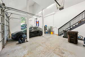 Garage featuring a garage door opener