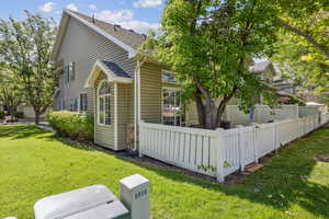 View of property exterior featuring a shingled roof
