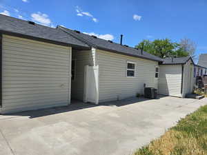 Rear view of property with a patio