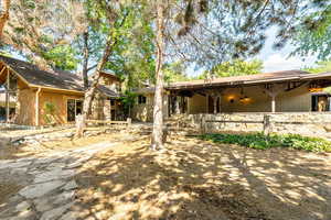 Back of property with brick siding