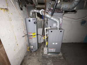 Utility room with gas water heater