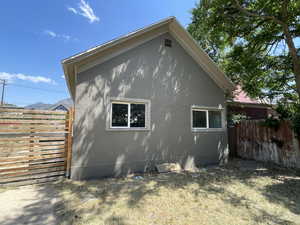 View of property exterior with stucco siding
