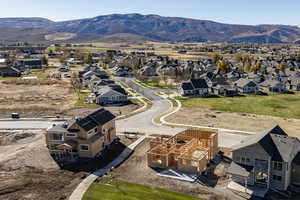 Aerial perspective of suburban area featuring mountains
