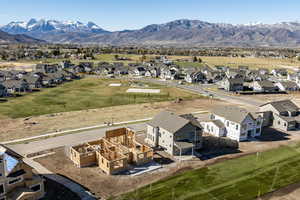 Aerial view of residential area with a mountainous background