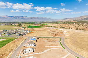 Aerial view of residential area featuring mountains