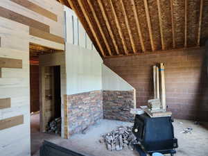 Misc room with vaulted ceiling