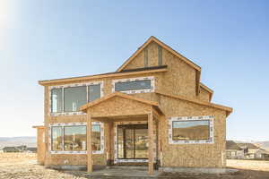 Rear view of house featuring crawl space