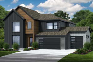 View of front facade featuring concrete driveway and an attached garage