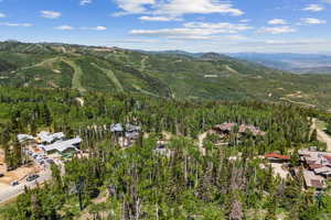 Aerial overview of property's location with mountains