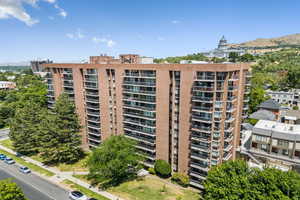 View of apartment building / complex featuring a mountain view