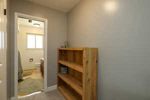 Bathroom featuring toilet and baseboards